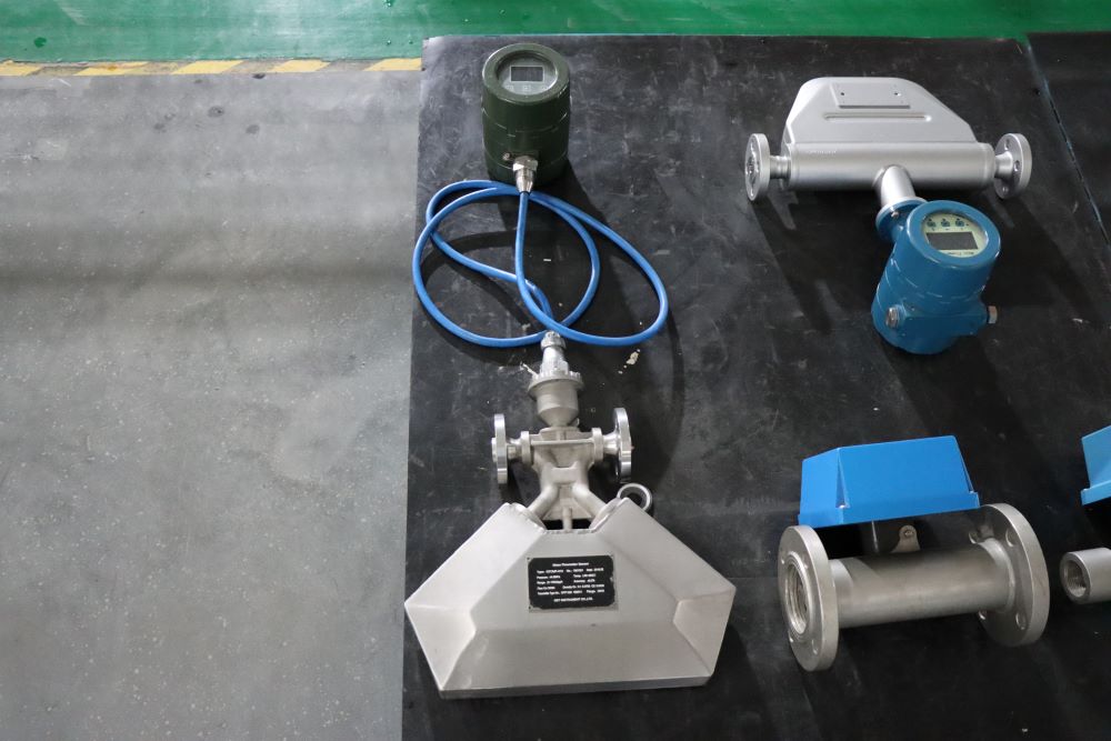 Which industries or fields widely apply Coriolis mass flowmeters